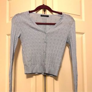 Brandy Melville button-up long-sleeve tee.